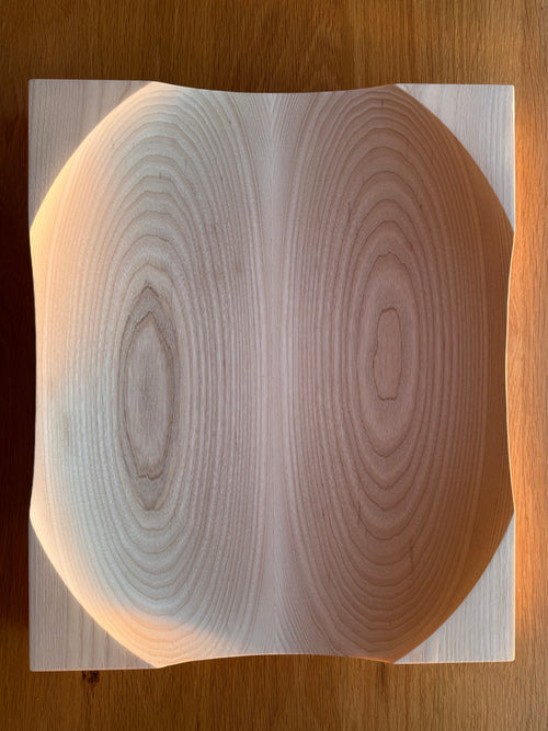 Tabletop display bowl, smooth contours cut into solid wood
